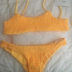 Two piece bathing suit. Brand new with tags.